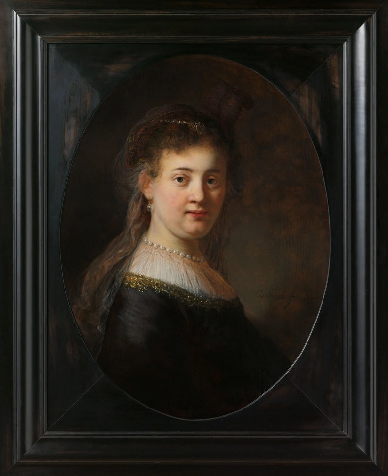 Fantastik kostümlü genç kadın - Rembrandt