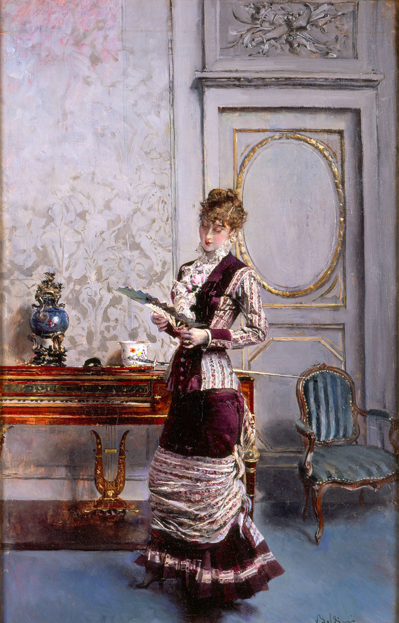 Berthe bir yelpazeye hayranlıkla bakarken - Giovanni Boldini