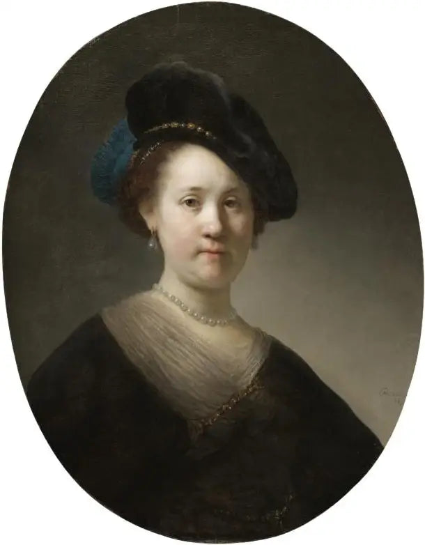 Tüy şapka takan genç bir kadının büstü - Rembrandt
