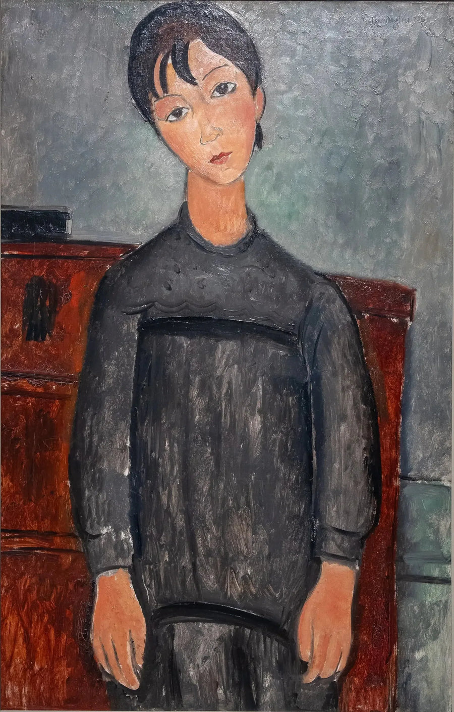 Siyah önlük giymiş ayakta duran kız - Amedeo Modigliani