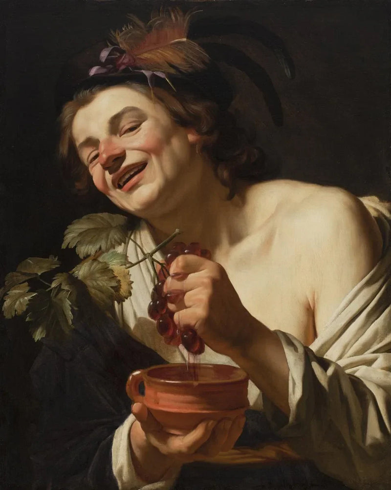 Güler yüzlü genç adam üzüm sıkıyor - Gerrit van Honthorst