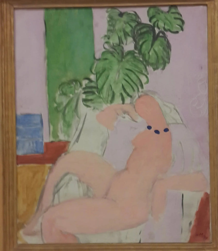 Yeşil bitki ile bir koltukta oturan - Henri Matisse