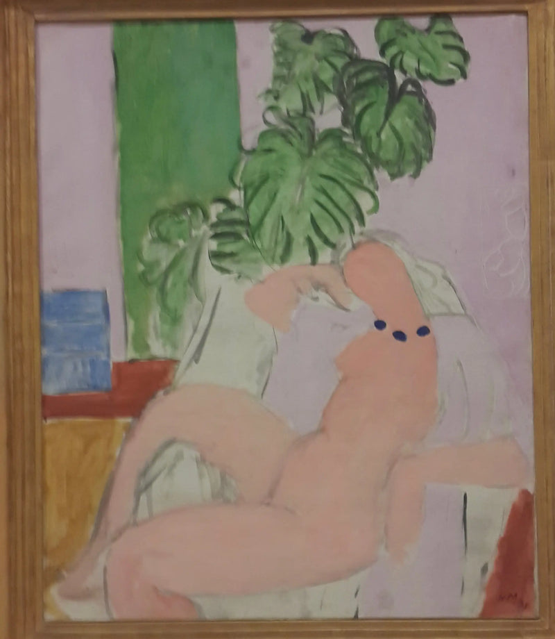 Yeşil bitki ile bir koltukta oturan - Henri Matisse