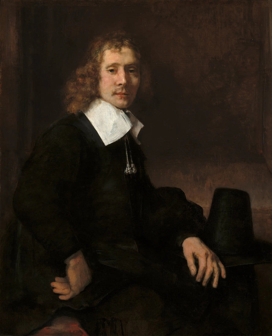 Bir masada oturan genç bir adam (belki Govaert Flinck) - Rembrandt